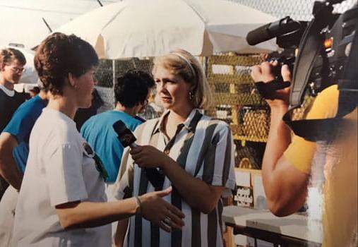 newscaster Gail Hogan interviewing